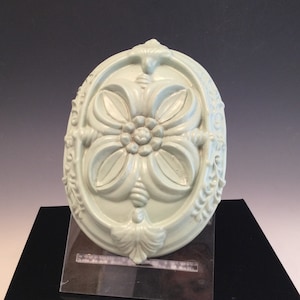 Vintage ornate ceramic wall hanging