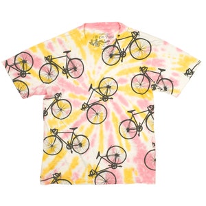 Women&#39;s T-shirt, Tie dyed bicycle all over printed, bicycles are printed  all over the white shirts and tie dyed yellow /pink.