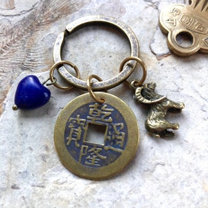 Feng shui zodiac goat key ring sales
