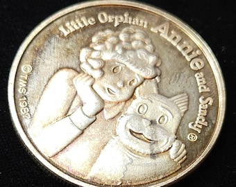 1987 Little  Orphan  Annie  And  Sandy  AMC Cartoon  Celebrities  1 Oz .999 Fine  SILVER - Regular 100