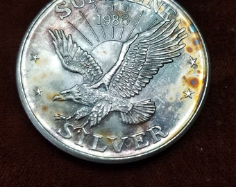 1986 Sunshine Silver Eagle -    1  ounce 999 silver round / coin - Reg 49 -   #385