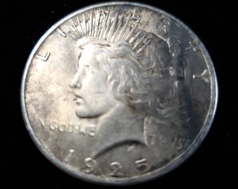 1925  Silver Peace Dollar AU - tarnish on obverse/reverse   Lot# 129