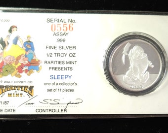 Disney  Sleepy    50th Anniversary Coin 1987 .999 Fine Silver 1/2 Troy Ounce  .999 Silver  -includes capsule & COA    lot # 99