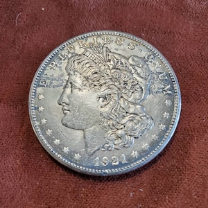 1921 S Silver Morgan Dollar AU black toning on front/ reverse corners  Lot#502