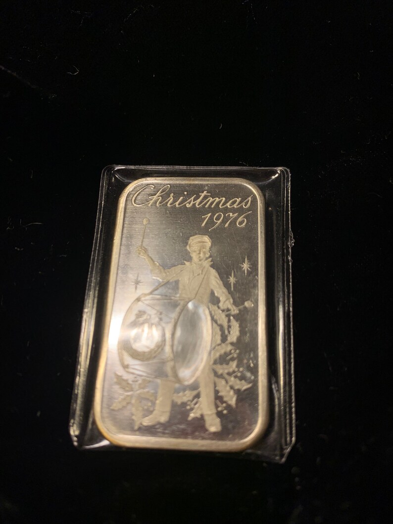 Christmas 1976-1 ounce 999 silver bar lot #25