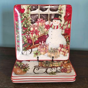 Snowman&#39;s Sleigh Christmas Dinner Plate Set of 4 by Certified International