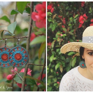 May include: Crocheted earrings with a blue and orange mandala design. The earrings are hanging from a branch with pink flowers. The earrings are also worn by a person in the image. The text "Re-Story Thread & Yarn" is visible in the image.