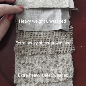 May include: Five samples of linen fabric in different weights and finishes. The samples are labelled "Dense extra heavy unwashed", "Heavy weight unwashed", "Extra heavy sheer unwashed", "Extra heavy sheer washed", and "Heavy sheer unwashed".
