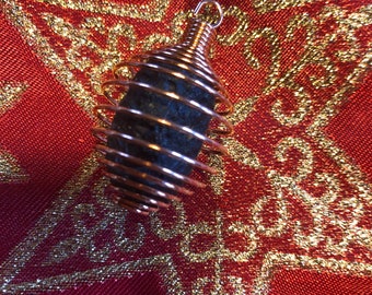 Colombianite pendant, (stone: size approx. 2.5 cm, weight 7.4 g) set in a spiral pendant made of copper, Colombia,