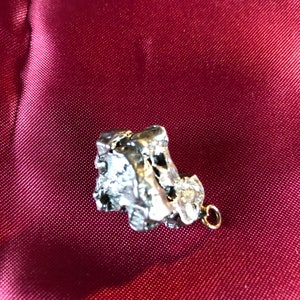 Meteorite pendant, pieces from Campo del Cielo, Argentina, weight 12 to 16 grams