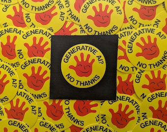 May include: A collection of yellow stickers with a red hand design and the text "GENERATIVE AI? NO THANKS". The stickers are scattered on a surface, with one sticker centered on a black square.