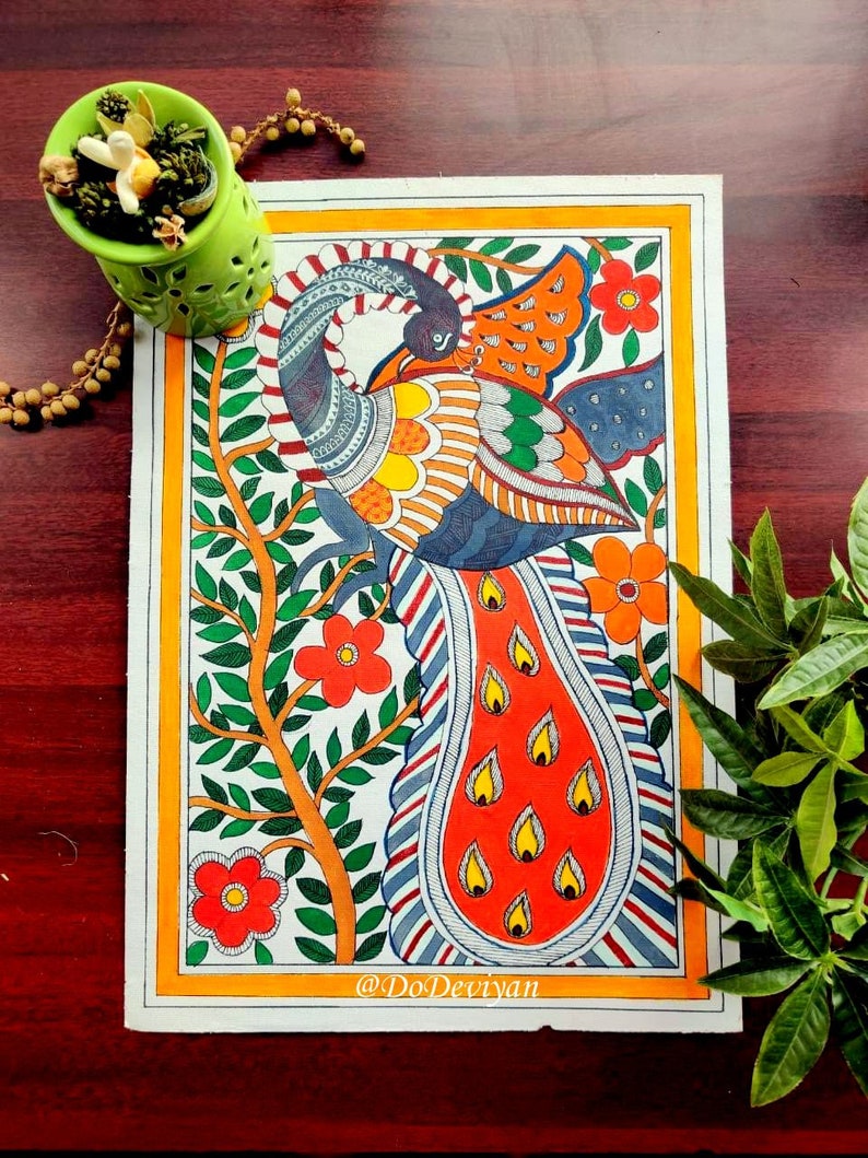 May include: A vibrant peacock painting with a red and orange tail, set against a white background with a yellow border. The artwork features a tree with red flowers and green leaves. The artist's name, @DoDeviyan, is visible.