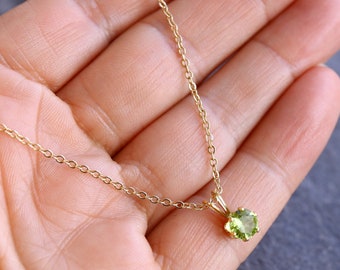 Gold peridot pendant deals