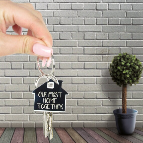 House shaped key clearance ring