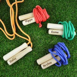 Christmas Eve Box Filler, Personalised Wood & Coloured Children&#39;s Skipping Rope, Xmas Stocking filler, Childs Name on a Jumping Rope