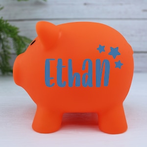 Children's Personalised Piggy Bank, Colourful Kids Money Box, Custom Vinyl, Stars, Hearts, Flowers, Any Name Customised, Nursery Decor Orange