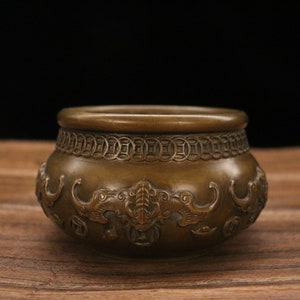 Chinese antique brass bat stove