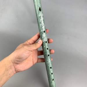 China&#39;s ancient exquisite jade flute is handmade