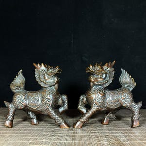 A pair of exquisite Chinese antique handmade pure copper Qilin statues