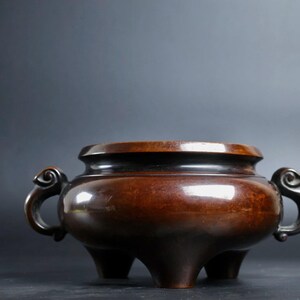 A rare and exquisite handcrafted Chinese antique copper Ruyi ear incense burner ornament