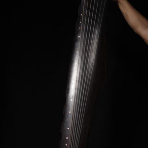 A rare and exquisite hand-made Chinese antique mahogany carved seven-stringed guqin ornament