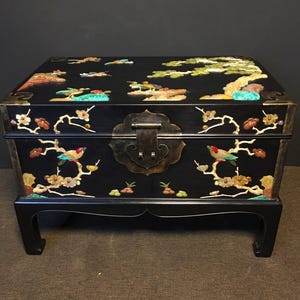Chinese antique, hand-carved rosewood jewelry box inlaid with precious stones, featuring a pine tree and crane symbolizing longevity.