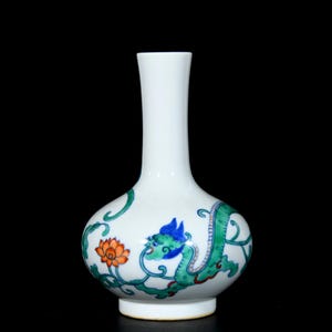 A rare and exquisite Chinese antique hand-painted doucai dragon-patterned long-necked vase ornament