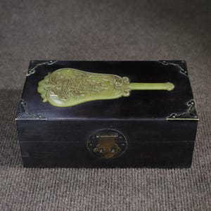 May include: A set of three ceramic mugs with a speckled, matte finish. The mugs are in shades of cream, light gray, and dark gray. Each mug has a simple, minimalist design, perfect for coffee or tea.