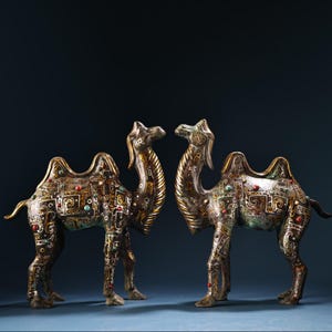 A pair of exquisite rare bronze camel statues inlaid with gemstones made by hand from China