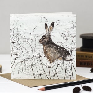 Carte de voeux lapin sous la neige