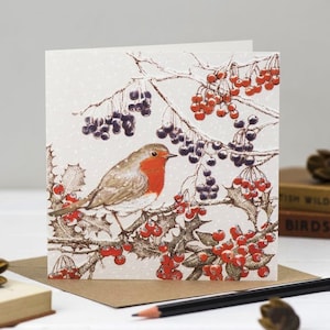 Carte de voeux rouge gorge sous la neige