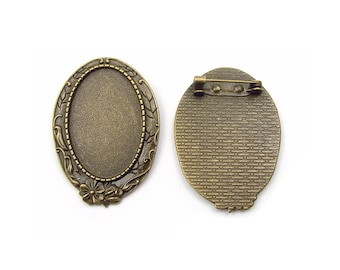 1 support broche pour cabochon oval 30x20mm fleurs bronze ancien