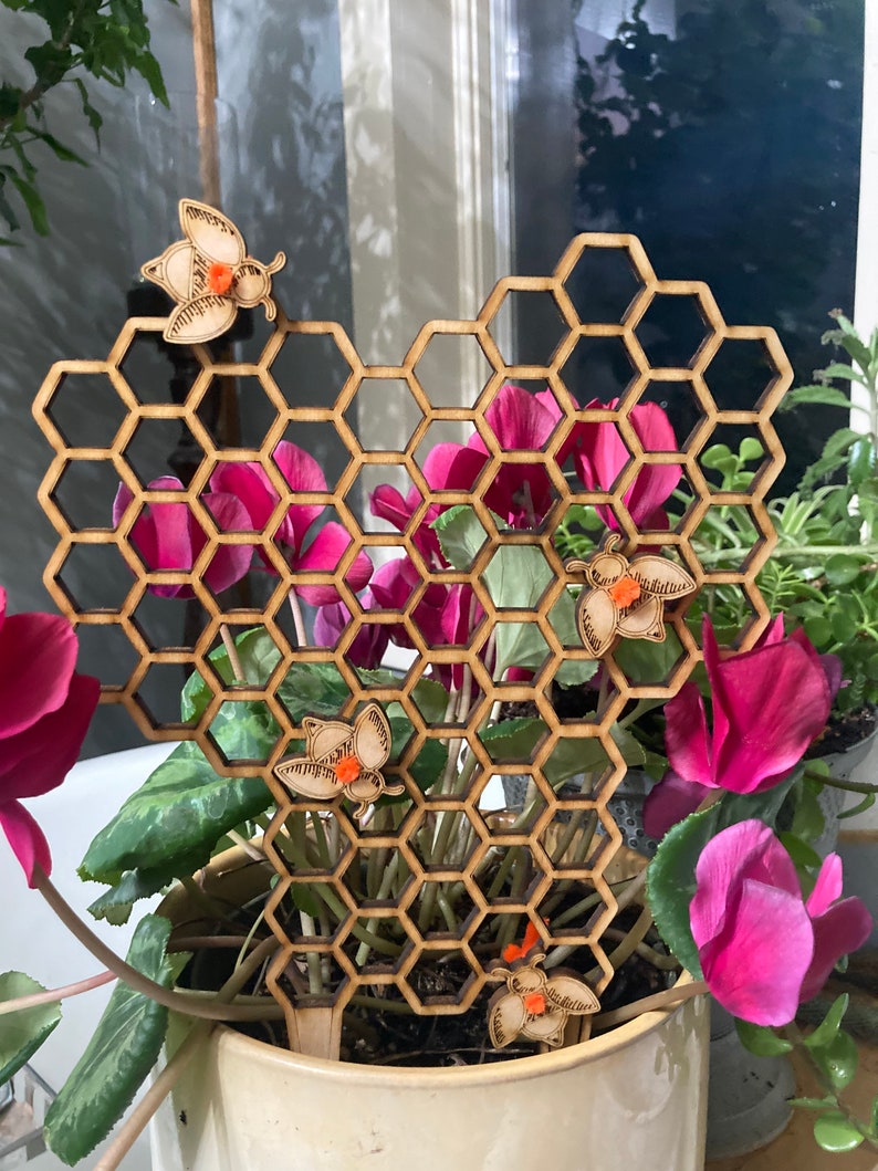 Honeycomb plant trellis with honey bees image 2