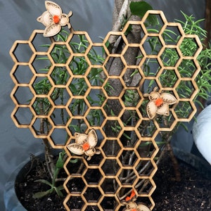 Honeycomb plant trellis with honey bees image 3