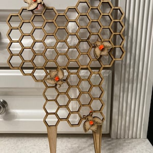 Honeycomb plant trellis with honey bees image 4