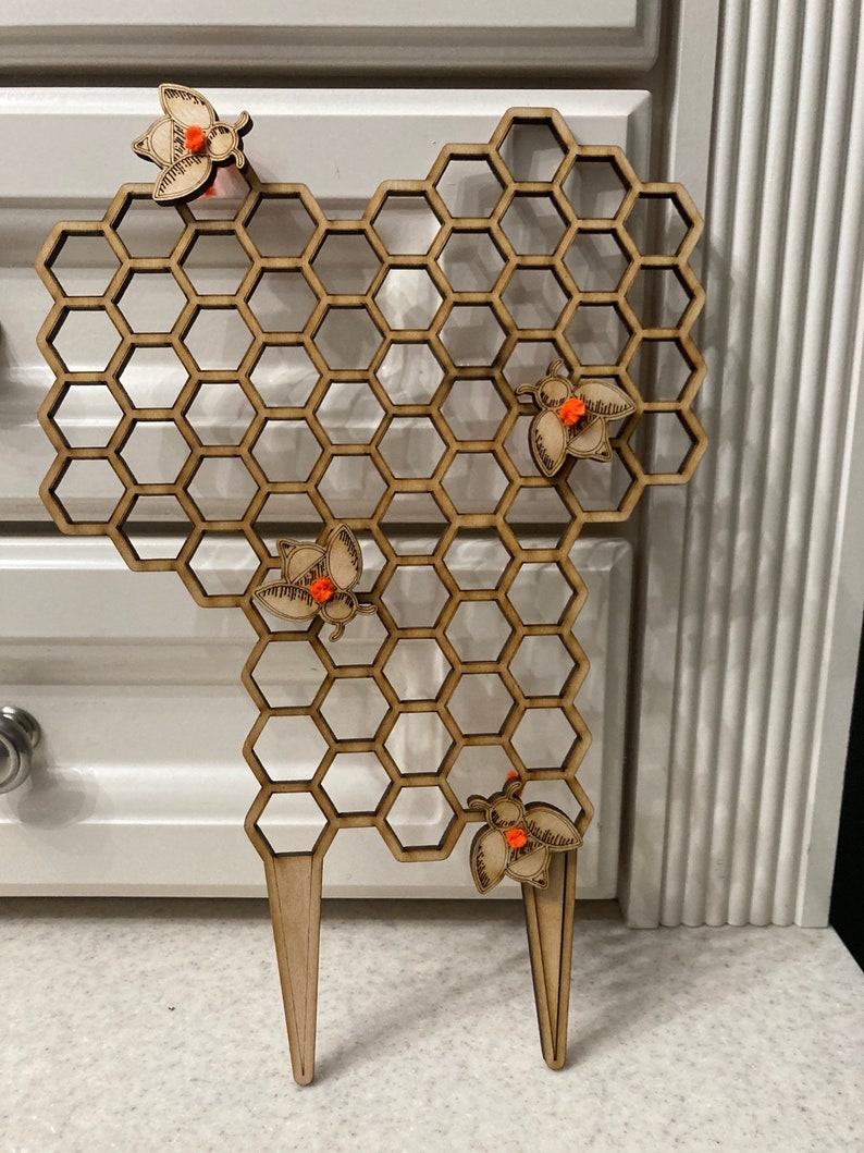 Honeycomb plant trellis with honey bees image 4