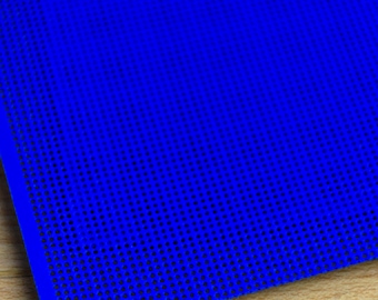 May include: A vibrant blue sheet of perforated material featuring a uniform grid of small, circular holes evenly spaced across the entire surface. The material has a flat, matte texture and a consistent, bright blue colour throughout the piece.