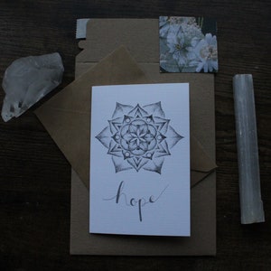 Wenskaart met mandala-hoop