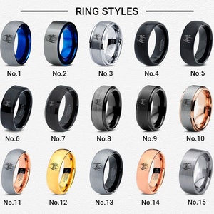 May include: Fifteen different styles of men's wedding bands. The bands are made of various metals, including silver, gold, and black tungsten. Each band features a unique design, including a brushed finish, a polished finish, and a hammered finish.