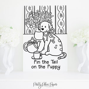 May include: Black and white printable game for a party. The game is called "Pin the Tail on the Puppy". The image shows a puppy sitting next to a teapot and a cup. There are flowers in a vase behind the puppy.