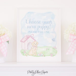 May include: A watercolor illustration of a puppy in a doghouse with a pink bow. The sign reads "Choose your new puppy! Please take one".