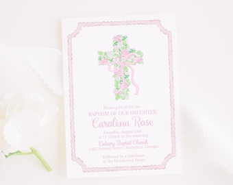 May include: A pink and green floral cross with a pink ribbon on a white card with the text "Please join us for the Baptism of our daughter, Carolina Rose. Saturday, August 2nd at 11 o'clock in the morning Calvary Baptist Church 1382 Second Street Anderson, Georgia Followed by a luncheon at the Henderson Home. Pretty Plain Paper"