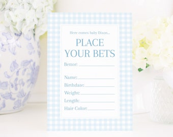 Może przedstawiać: Karta do gry na baby shower w kratkę niebiesko-białą z tekstem "Oto malutki Dixon... Złóż swoje zakłady." Karta zawiera miejsca na imię gracza, datę urodzenia, wagę, długość i kolor włosów.