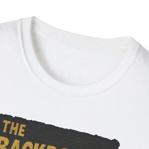 Distressed VHS-style Backrooms graphic on a black tee, showcasing creepy endless hallways and retro analog grain, inspired by creepypasta and found-footage horror.
