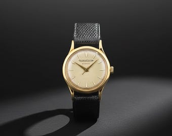 Jaeger-LeCoultre vintage dameshorloge uit de jaren 60, 18 karaat geelgoud, handopwindbaar, 25 mm, zwarte leren band, ref. 595570