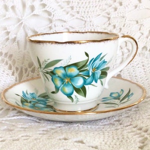 Beautiful English bone china cup & saucer, white with turquoise