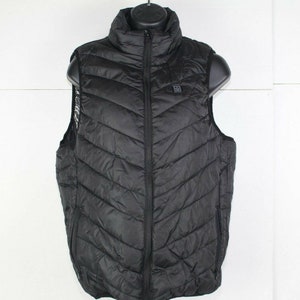 ladies very clean puffer vest size M
