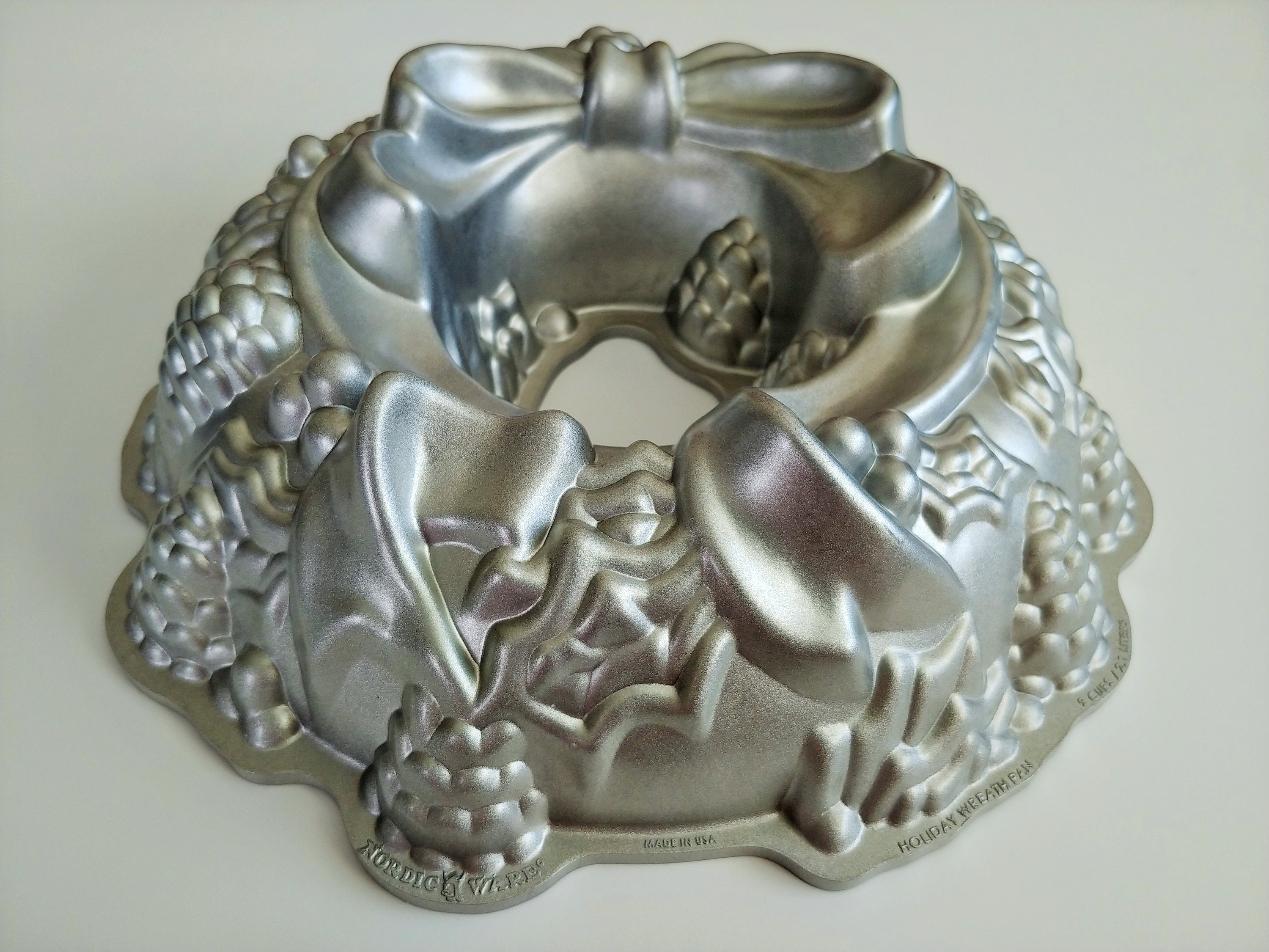 Nordic Ware 2006 60th Anniversary Cast Aluminum 10-15 Cup Bundt Pan -  household items - by owner - housewares sale 