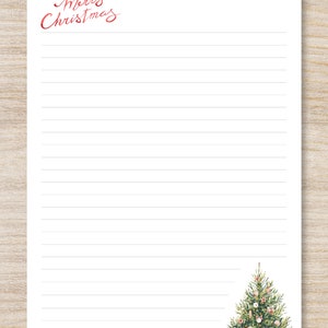 May include: A white lined paper with the words "Merry Christmas" written in red at the top. A watercolor illustration of a Christmas tree with ornaments is at the bottom of the page.