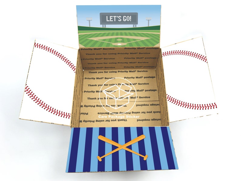 May include: Open cardboard box with a baseball theme. The box is decorated with a baseball diamond, baseballs, and bats. The box is open and the inside is lined with blue and white stripes. The box has a sticker that says "Care Package Sticker".